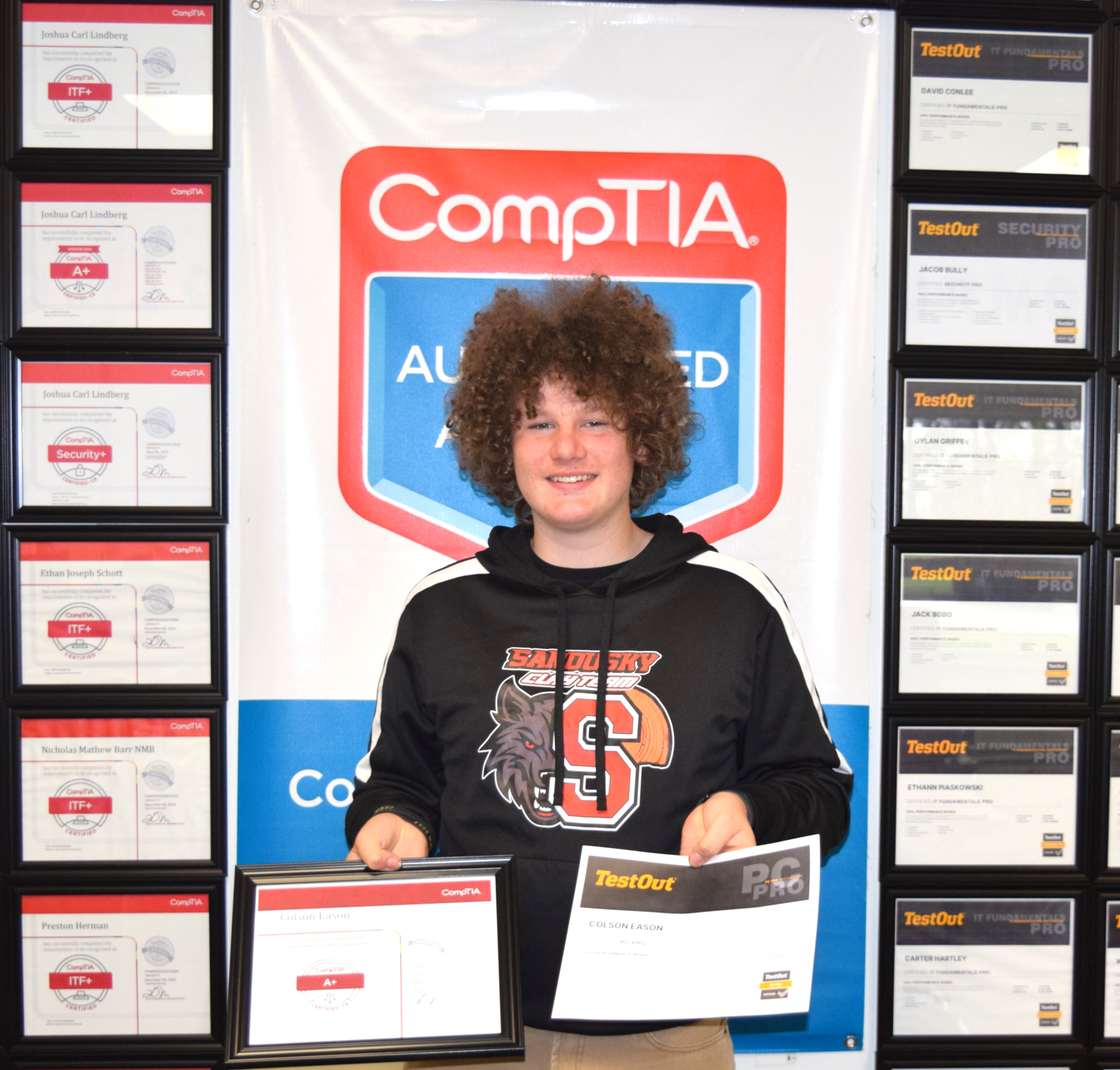 Sandusky student holding earned certifications